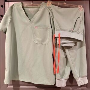 FIGS Jade Green Scrub Set with Orange tie Caterina and Zamora